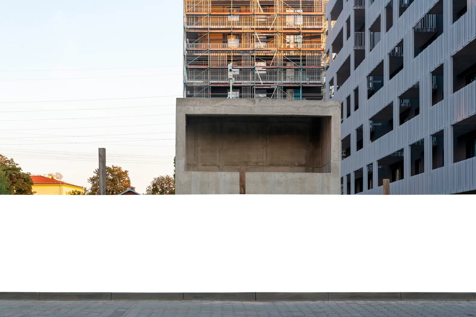 A blank hoarding along a development site